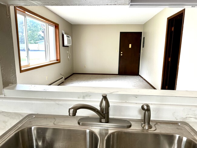 Kitchen view to living room - F and H Apartments