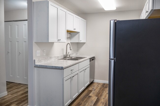 Step into modern elegance at The Gallery with this sleek kitchen featuring high-end finishes, ample storage, and stainless steel appliances. Perfect for culinary creativity. Schedule your tour today and see what awaits! - The Gallery Apartments