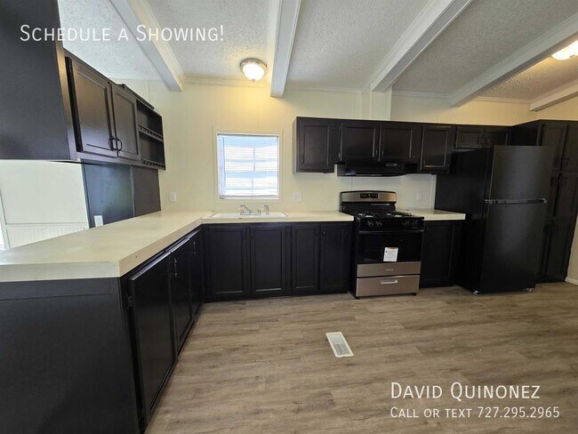 Building Photo - Sale Prices Starting at: $34,999 or Lease ...