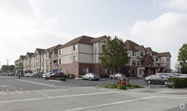 Building Photo - Rose Gardens Apartments