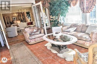 Building Photo - 5506 Woodchase Crescent