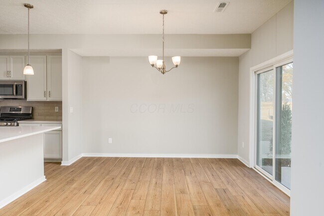 Foto del edificio - 6426 Hamilton Woods Blvd N