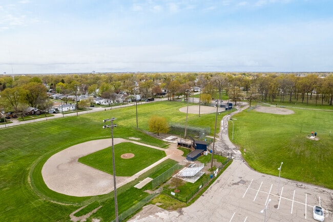 Bring your dog for a walk, go for a run, or watch the ball game at Green Acres Park.