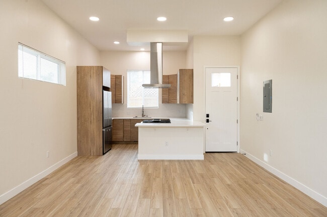 Brand new kitchen- European cabinets, quartz cabinets & backsplash, bar seating - 4772 Bancroft St
