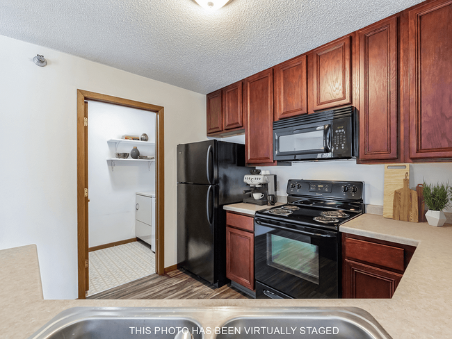 Kitchen with Built in Microwave! - The Meadows of Coon Rapids