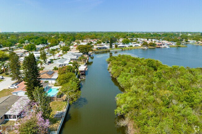 In Holiday Lake Estates there are many homes that are right on the water near Holiday.