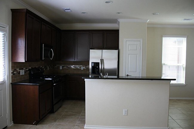 Foto del edificio - 6454 Calgary Woods Ln