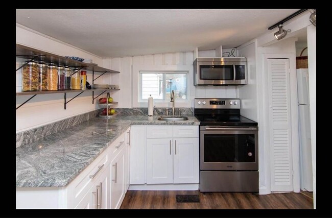 New kitchen with granite countertops stainless appliances - 55 Box Pond Dr