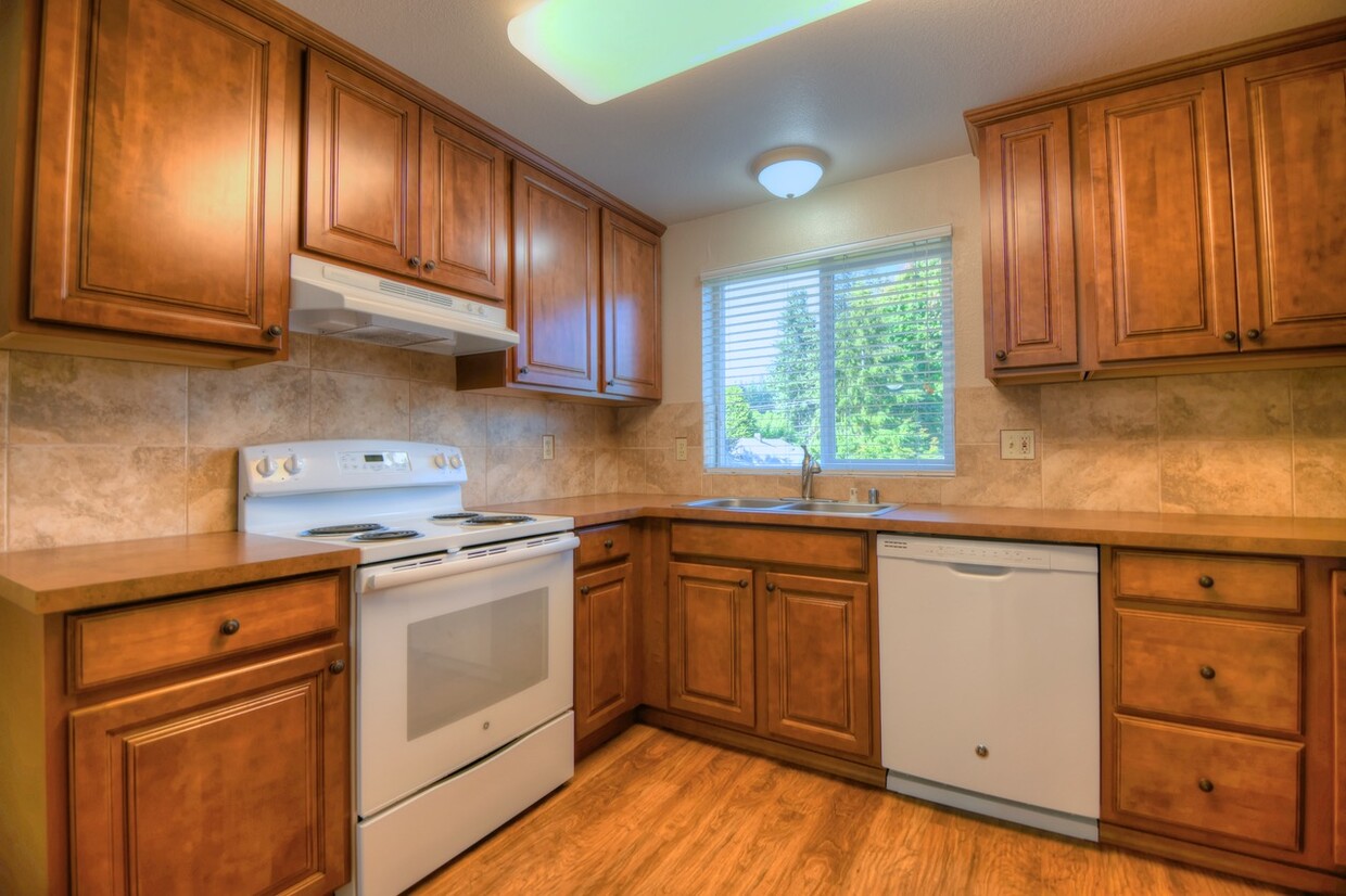 Large, well organized kitchen. Color palette will vary by apartment. - 1206 Sleater Kinney Rd SE