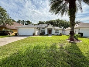 Building Photo - 8716 Canopy Oaks Dr