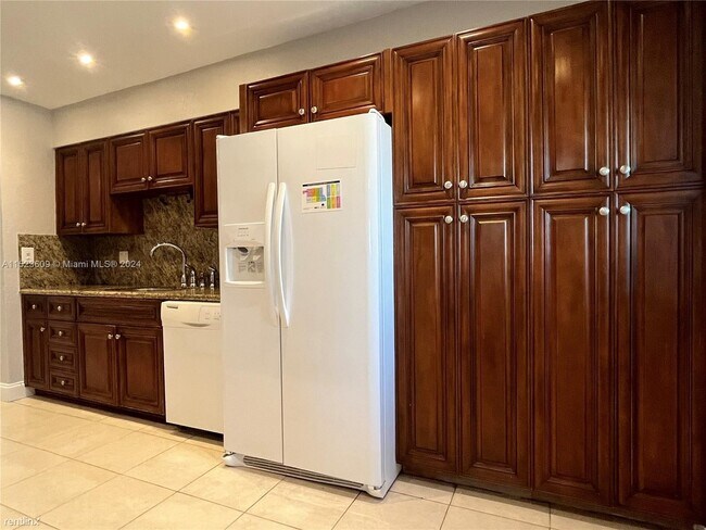 Building Photo - 4 br, 2.5 bath House - 4973 SW 91st Ter