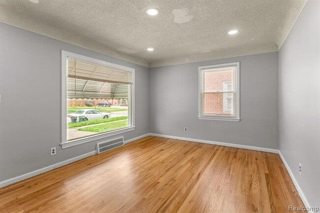 Building Photo - Cozy & Modern: 2-Bed Brick Home with Garage & Finished Basement