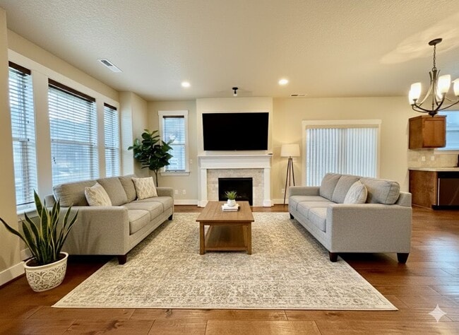 Photo - Modern 4-Bedroom Gem | Maintenance-Free Living & Private Side Yard! House