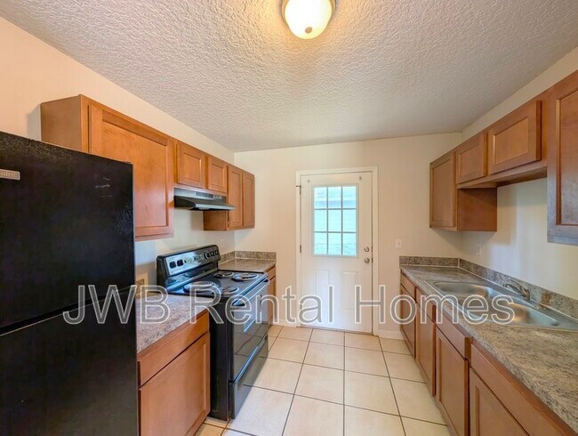 Building Photo - 8364 Eaton Ave