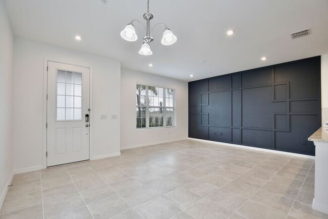 Building Photo - Luxurious 3/2.5 Modern Townhome with a Pri...