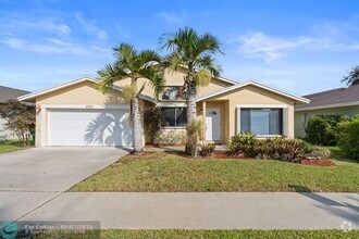 Building Photo - 10091 SW 16th Pl