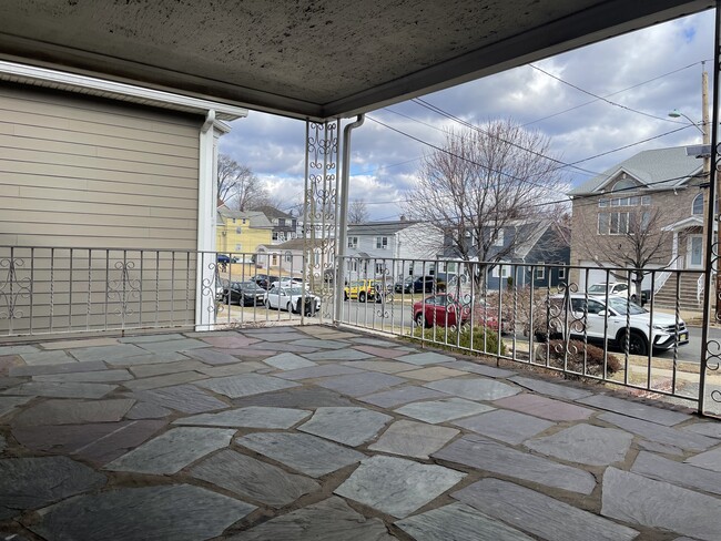 and an airy, open front porch - 734 Lake Ave