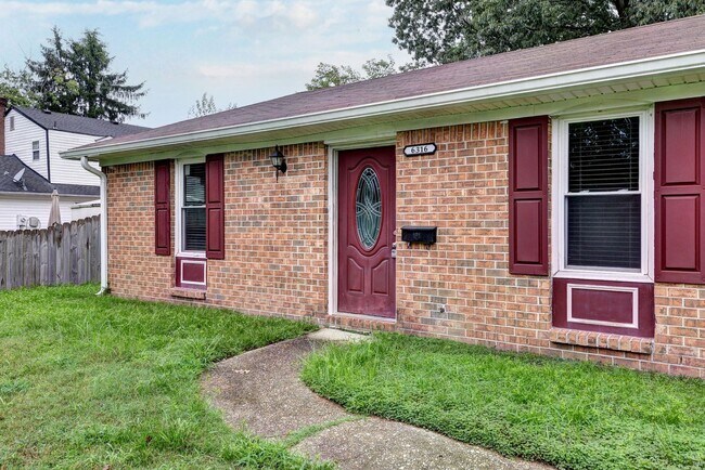 Building Photo - Spacious brick Rancher