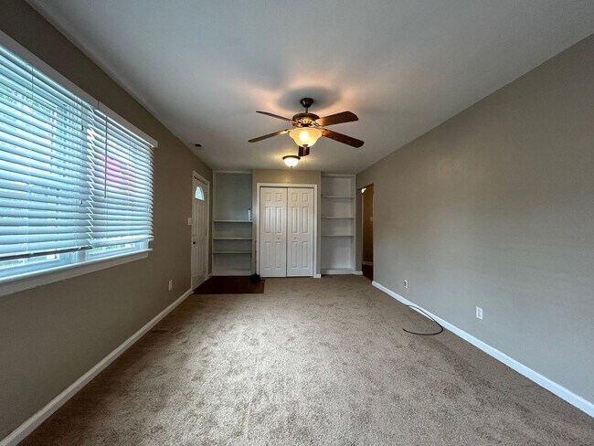Building Photo - Welcome to this charming single family hom...