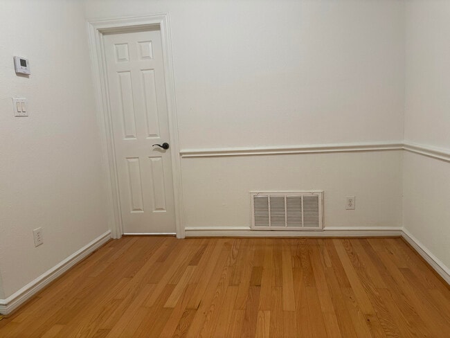 Dining with hardwood floors - 2700 Revere St