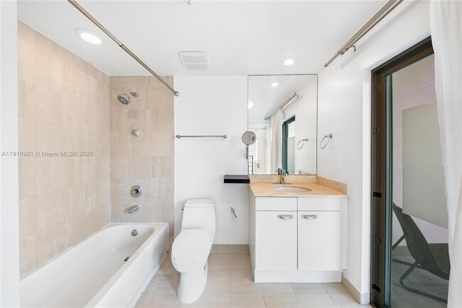 Building Photo - 7700 Collins Ave