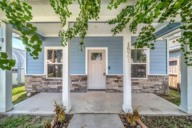 Building Photo - Welcome to this charming Craftsman-style r...