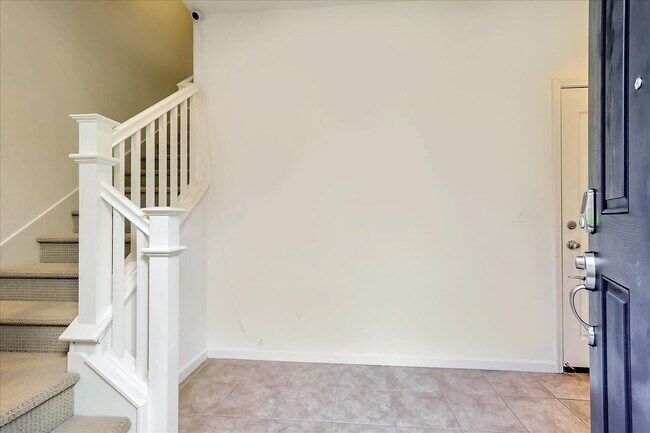 Building Photo - TOSCANA TOWNHOME EMBRACES LUXURY LIVING PR...