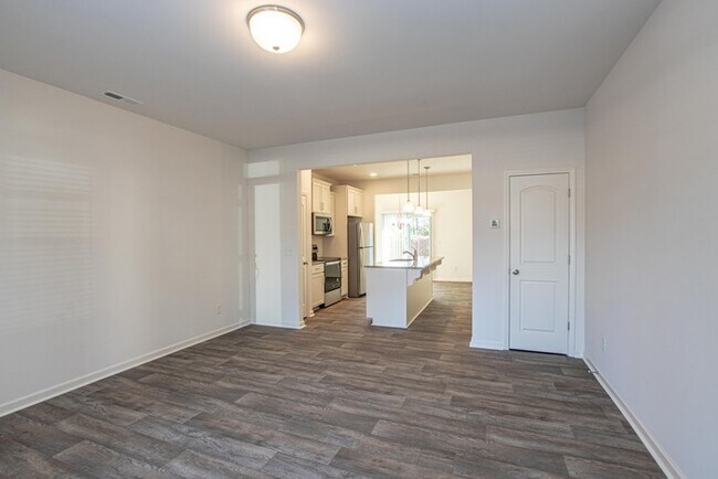 Foto del edificio - BEAUTIFUL 2 Bedroom Townhome in Cox Mill District AVAILABLE JUNE 2026