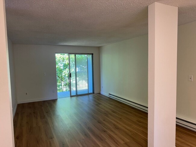 Building Photo - Charming Condo with Creek Views, Laminate ...
