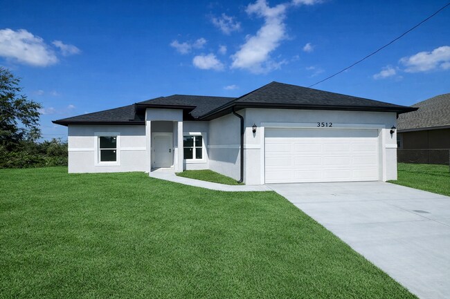 Foto del edificio - JUST BUILT! 4 Bed / 2 Bath Home with 2 Car Garage- In Desirable SW Lehigh Acres Location