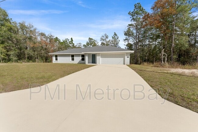 Building Photo - 9461 N Sandree Dr