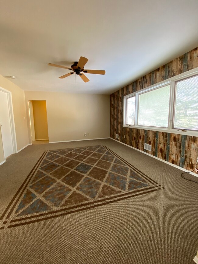 Carpet will be replaced with hardwood floor and wall paper will be removed. - 57 Morgan Ln