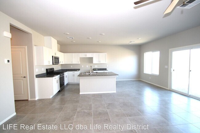 Building Photo - 4 br, 3 bath House - 8255 Selenite St.