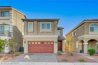 Building Photo - 7775 Tyrell Peaks St
