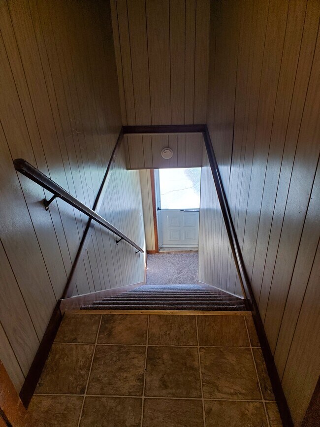Stairway looking down - 131 W Utica St