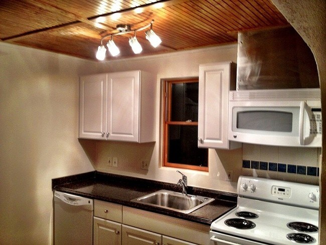 Part of kitchen now has a window on the left - 1904 N Woodley St