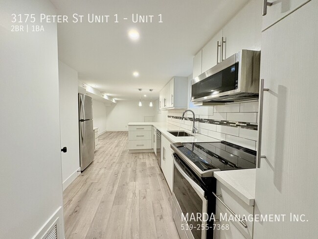 Photo du bâtiment - BEAUTIFULLY RENOVATED 2BEDROOM/1BATH + HYD...