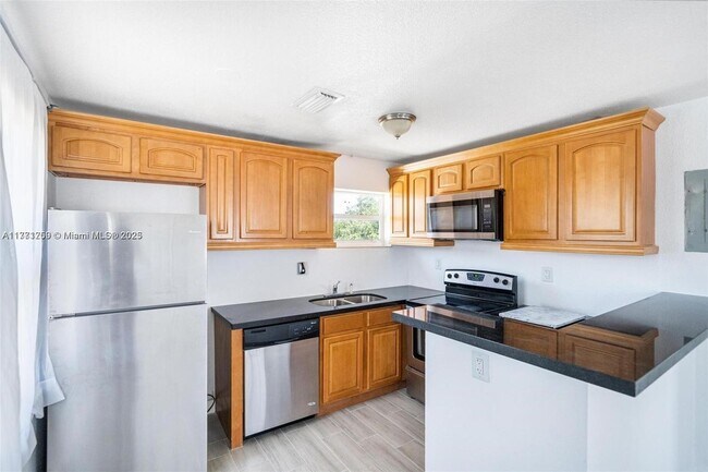 Foto del edificio - 6221 NW Miami Ct