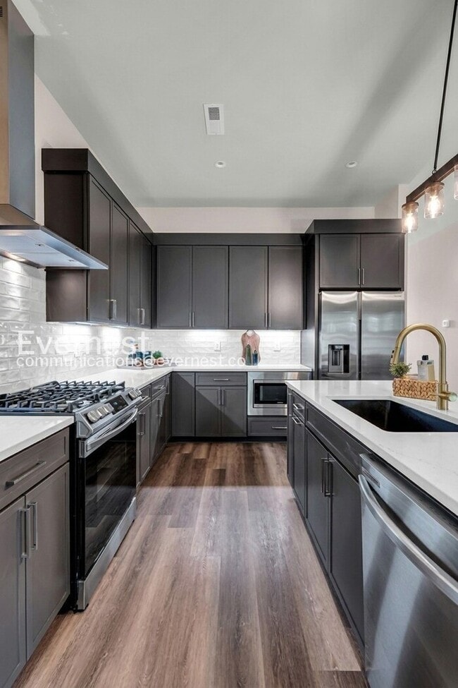 Photo - Modern 3 Bed, 3.5 Bath Townhome with Attached Garage / 3 Bed & 3.5 Bath / Pet-friendly / Coming S...