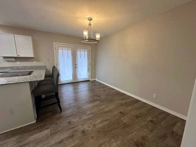 Building Photo - Welcome to this charming 3-bedroom, 2-bath...