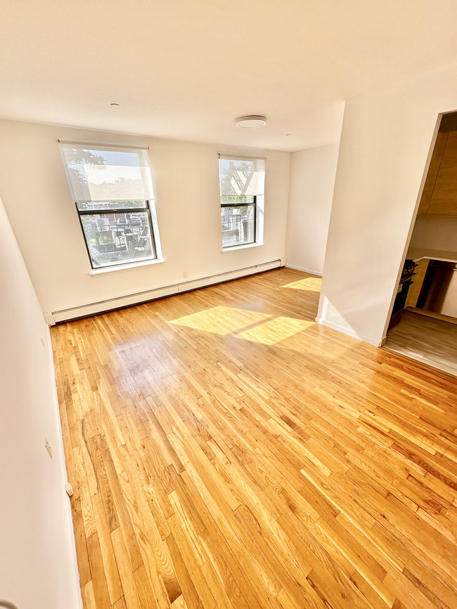 Living Room / Dining Area - 2322 Adam Clayton Powell Jr Blvd