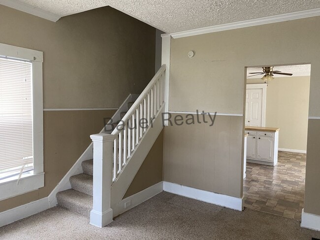 Building Photo - Three Bedrooms, One and a Half Baths
