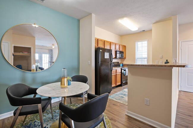 Open Floor Plan Dining and Kitchen Area - Hartshire Lakes Apartments