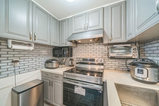 Foto del edificio - Charming central 3BR Condo in Honolulu