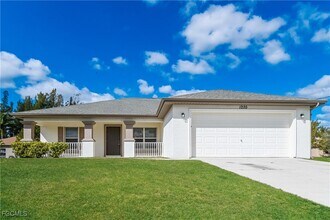 Building Photo - 1220 NW 26th Ave