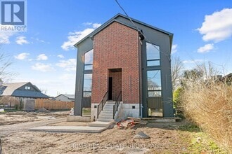 Building Photo - 417-417 Base Line Rd E