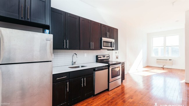 Building Photo - 4 br, 2 bath Apartment - 597 Central Ave