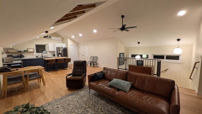 Main room lit up in evening - 3617 W Alice Ave