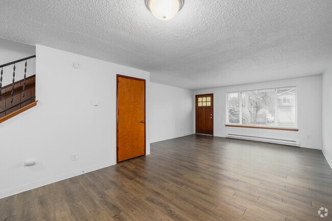 2 habitaciones, 1,5 baños - 1177 pies cuadrados - Sala de estar - Aladdin Townhomes
