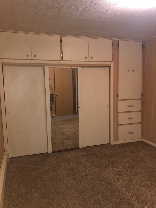Bedroom 1 has a ton of built in storage, maximizing space. - 210 27th St NE